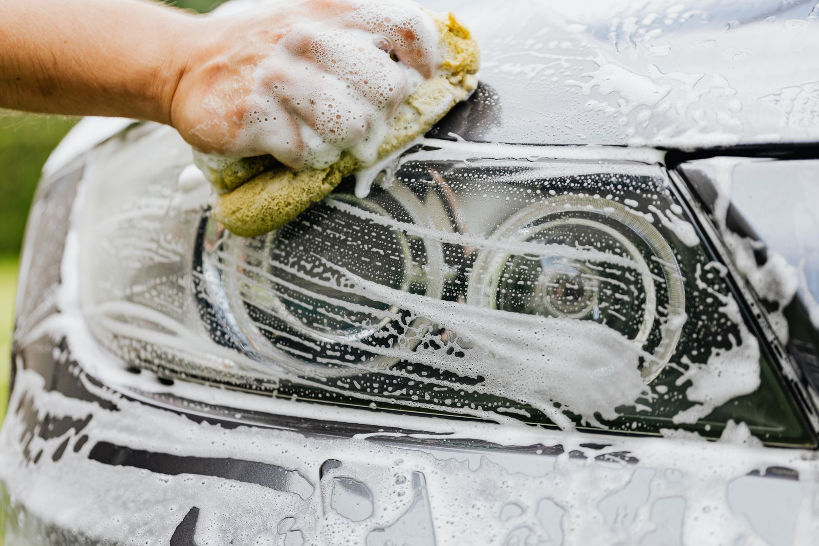 A car being hand washed in the Heritage bay