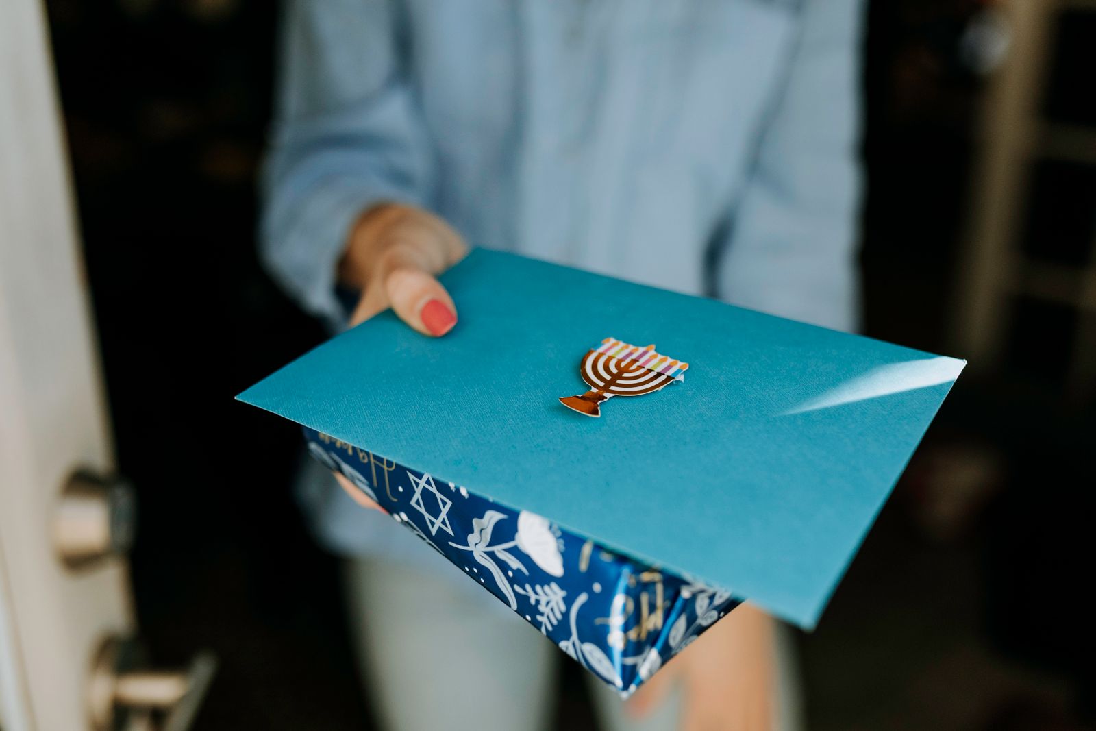 A gift certificate envelope on a workbench
